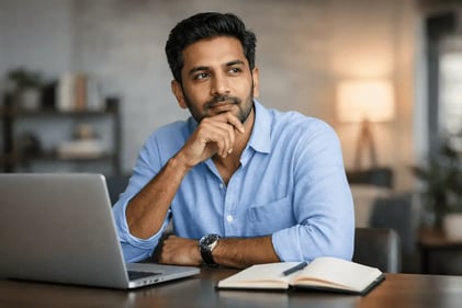 Indian guy thinking about private health insurance