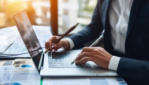 A business professional reviewing various legal in